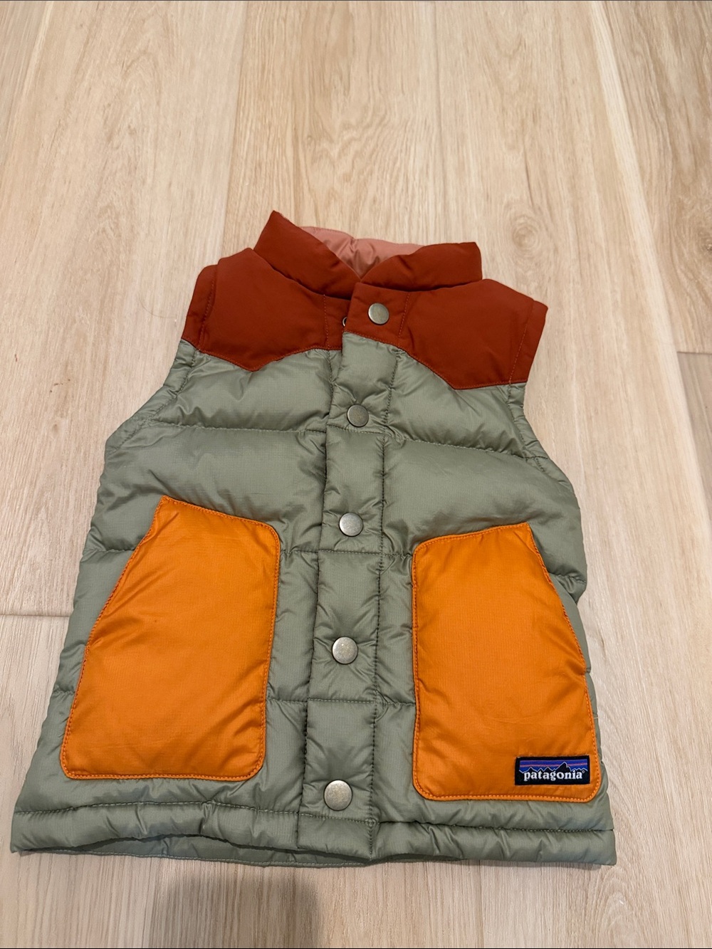 Patagonia Kids Vest in Olive Green, Orange & Rust